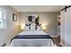 Relaxing bedroom with a well-decorated bed, complemented by soft lighting and elegant artwork at 2932 Valley Ridge Dr, Decatur, GA 30032