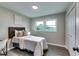 Cozy bedroom with natural light, comfortable bed, and view to exterior at 2932 Valley Ridge Dr, Decatur, GA 30032