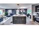 Spacious open floor plan featuring kitchen with island seating and a living room area at 2932 Valley Ridge Dr, Decatur, GA 30032