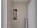 A simple laundry room nook with water and electrical hookups at 2932 Valley Ridge Dr, Decatur, GA 30032