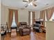 Office space with a ceiling fan and hardwood flooring at 1078 Camry Cir, Dallas, GA 30157