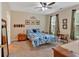 Comfortable bedroom features carpeted floors, neutral walls, and large windows at 1078 Camry Cir, Dallas, GA 30157