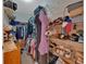 Walk-in closet features built-in shelving and plenty of storage for shoes and clothes at 1078 Camry Cir, Dallas, GA 30157