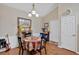 Charming dining area with table, chairs, and hardwood floors at 1078 Camry Cir, Dallas, GA 30157