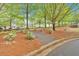 Scenic walking path adorned with trees and flowering bushes at 1078 Camry Cir, Dallas, GA 30157