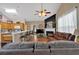 Bright and inviting living room with a fireplace and seamless access to the kitchen at 1078 Camry Cir, Dallas, GA 30157