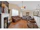 Comfortable living room showcasing a fireplace, hardwood floors, and open layout at 1078 Camry Cir, Dallas, GA 30157