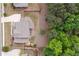 Aerial view of the home showcasing the fenced backyard, patio, and mature trees at 124 Grand Oaks Dr, Canton, GA 30115