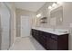 Elegant bathroom featuring a glass-enclosed shower, double vanity, and stylish tile flooring at 124 Grand Oaks Dr, Canton, GA 30115