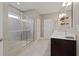 Elegant bathroom featuring a glass-enclosed shower, double vanity, and stylish tile flooring at 124 Grand Oaks Dr, Canton, GA 30115