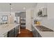 Modern kitchen featuring granite countertops, stainless steel appliances, and hardwood floors at 124 Grand Oaks Dr, Canton, GA 30115