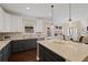Bright kitchen featuring a center island, stainless appliances and open floor plan at 124 Grand Oaks Dr, Canton, GA 30115