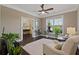Bright living room with hardwood floors, natural light, and neutral decor at 124 Grand Oaks Dr, Canton, GA 30115