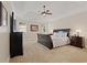 Spacious main bedroom with tray ceiling, plush carpet, and ample natural light at 124 Grand Oaks Dr, Canton, GA 30115
