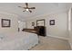 Serene main bedroom with neutral decor, plush carpet, and tray ceiling, creating a relaxing space at 124 Grand Oaks Dr, Canton, GA 30115
