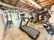 Basement area with a treadmill, exposed ceiling, and ample storage space, ideal for a home gym or workspace at 2771 Stonecreek Se Rd, Smyrna, GA 30080