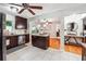 Well-appointed kitchen featuring stainless steel appliances, granite countertops, and dark wood cabinetry for ample storage at 2771 Stonecreek Se Rd, Smyrna, GA 30080