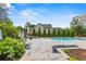 Relaxing backyard featuring a pool, spa, lush landscaping, and lounge area for leisure at 3967 Manson Se Ave, Smyrna, GA 30082