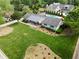 Expansive home featuring a lush lawn, covered porch, and backyard pool at 3967 Manson Se Ave, Smyrna, GA 30082