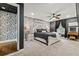 Stylish bedroom features patterned wallpaper, a cozy bed, and dark curtains for a relaxing atmosphere at 3967 Manson Se Ave, Smyrna, GA 30082