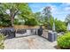 Backyard area with an outdoor kitchen setup, perfect for hosting and entertaining guests at 3967 Manson Se Ave, Smyrna, GA 30082