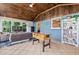 Bright sunroom with foosball table, comfortable seating, and a view of the outdoors at 3967 Manson Se Ave, Smyrna, GA 30082