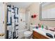 Bathroom featuring a shower with a blue and white curtain and a single sink at 2171 Wilson Nw Ave, Atlanta, GA 30314