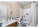 Bathroom featuring a shower with a white curtain and a single sink at 2171 Wilson Nw Ave, Atlanta, GA 30314