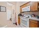 Efficient kitchen with essential appliances, bright lighting, and easy access to other living areas of the home at 2171 Wilson Nw Ave, Atlanta, GA 30314