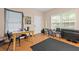 Versatile living space with natural light and hardwood floors, perfect for relaxation and home office setup at 2171 Wilson Nw Ave, Atlanta, GA 30314