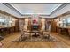 A classically decorated formal living room features traditional wood paneling, a decorative fireplace, and ample seating at 2865 Lenox Ne Rd # 211, Atlanta, GA 30324