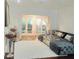 Stylish living room with balcony access, plush seating, and elegant decor at 2865 Lenox Ne Rd # 211, Atlanta, GA 30324