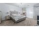 Luxurious main bedroom featuring plush bedding, elegant decor, and ambient lighting for a relaxing atmosphere at 2865 Lenox Ne Rd # 211, Atlanta, GA 30324