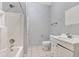 Bathroom featuring a white vanity, toilet, tub, and tile floor at 902 Allene Sw Ave, Atlanta, GA 30310