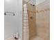 Clean bathroom featuring a tile shower with new shower head and fixtures at 902 Allene Sw Ave, Atlanta, GA 30310