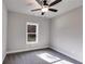 A simple bedroom with gray walls and a ceiling fan at Lot 1 Perkins Rd, Dallas, GA 30157