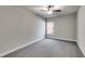 Light-filled bedroom with a neutral color palette, window, and plush carpeting at Lot 1 Perkins Rd, Dallas, GA 30157