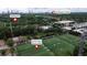 The aerial view shows the property's location in relation to local sport fields and the Buckhead area at 1555 New Ne St, Atlanta, GA 30307