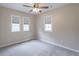 Cozy bedroom with natural light and neutral tones offering a serene atmosphere at 1555 New Ne St, Atlanta, GA 30307