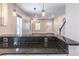 Open-concept kitchen with granite countertops that flow into the living room at 1555 New Ne St, Atlanta, GA 30307
