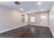 Spacious living room with hardwood floors, natural light, and neutral paint tones at 1555 New Ne St, Atlanta, GA 30307