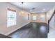 Bright and airy living room featuring hardwood floors, neutral walls, and natural light at 1555 New Ne St, Atlanta, GA 30307