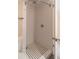 Step into this shower featuring subway tile, mosaic tile floor, and a modern rainfall shower head at 1555 New Ne St, Atlanta, GA 30307