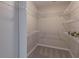 Walk-in closet featuring ample shelving for organizing your wardrobe at 1555 New Ne St, Atlanta, GA 30307