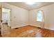 Bedroom with hardwood floors and window, providing plenty of natural light at 1798 Melrose Sw Dr, Atlanta, GA 30310