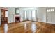 Spacious living room with hardwood floors, fireplace, and a bright, welcoming atmosphere at 1798 Melrose Sw Dr, Atlanta, GA 30310
