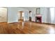 Bright living room featuring hardwood floors, fireplace, and plenty of natural light at 1798 Melrose Sw Dr, Atlanta, GA 30310