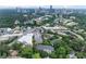 An aerial view shows the skyline and surrounding neighborhood at 3636 Habersham Nw Rd # 2101, Atlanta, GA 30305