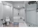Modern bathroom featuring a glass-enclosed shower, soaking tub, and sleek fixtures at 3636 Habersham Nw Rd # 2101, Atlanta, GA 30305
