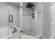 Bathroom with a glass-enclosed shower with a rainfall shower head and a jetted soaking tub at 3636 Habersham Nw Rd # 2101, Atlanta, GA 30305